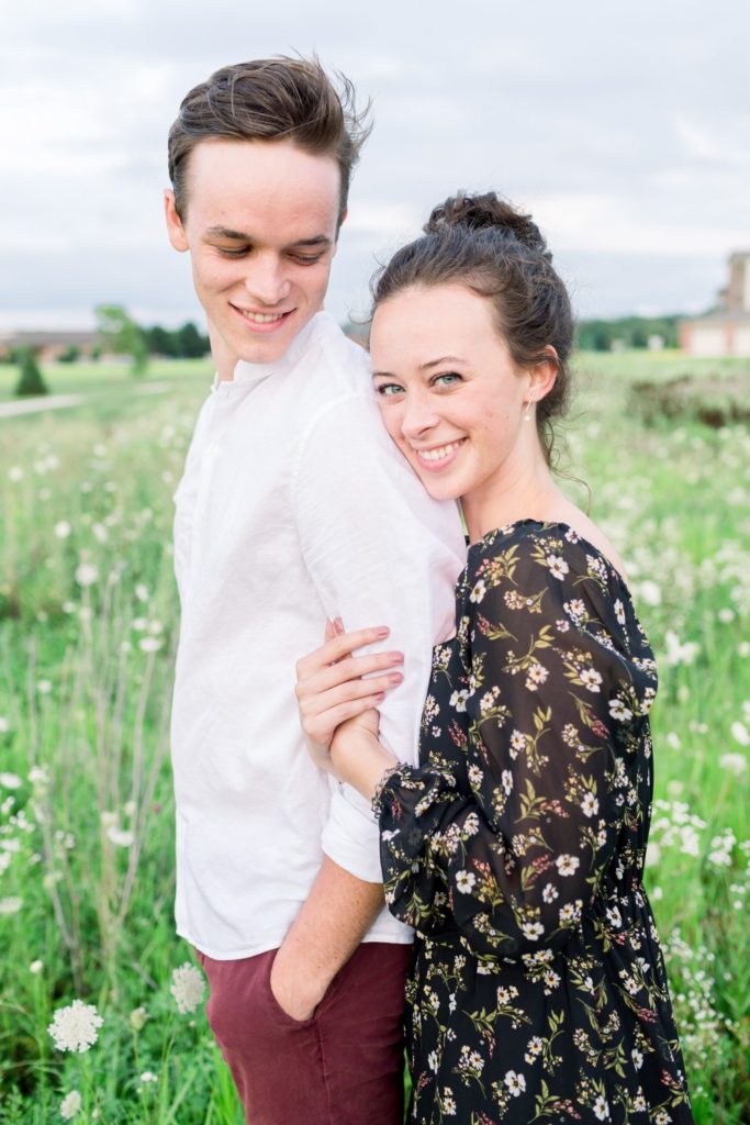 catholic-engaged-couple-engagement-photos-in-flower-field-by-indianapolis-wedding-photographer